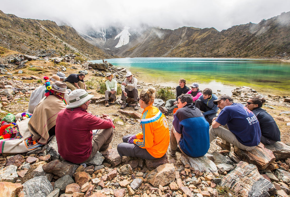 Group of travelers enjoying a curated adventure in the Peruvian Andes guided by local experts, Outer Experiences style.