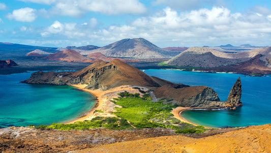 Panoramic view of the Galápagos Islands with volcanic cliffs and turquoise waters