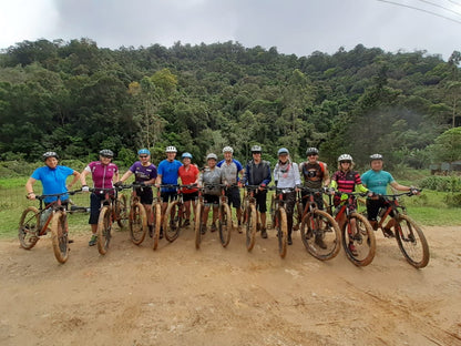 Cyclist riding through valleys and coffee plantations on the Costa Rica coast to coast route